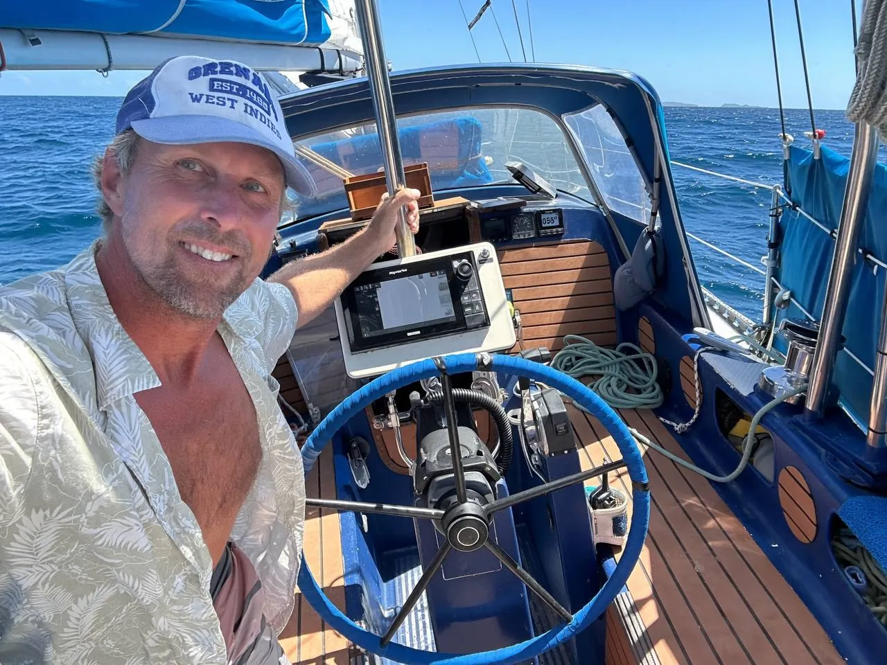 Tyler Martin aboard his sailing yacht in the Caribbean